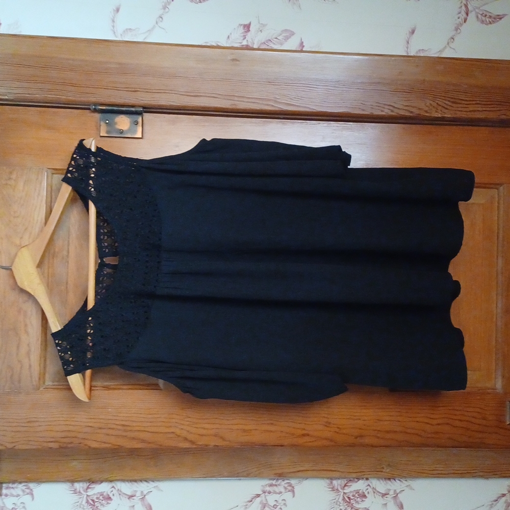 Ladies black top with lace and cut out shoulders